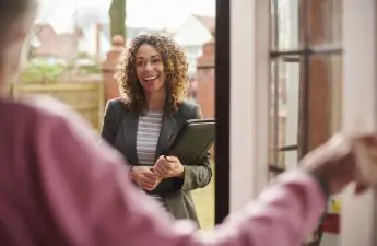 landlord discussing cozy rent payment with tenant