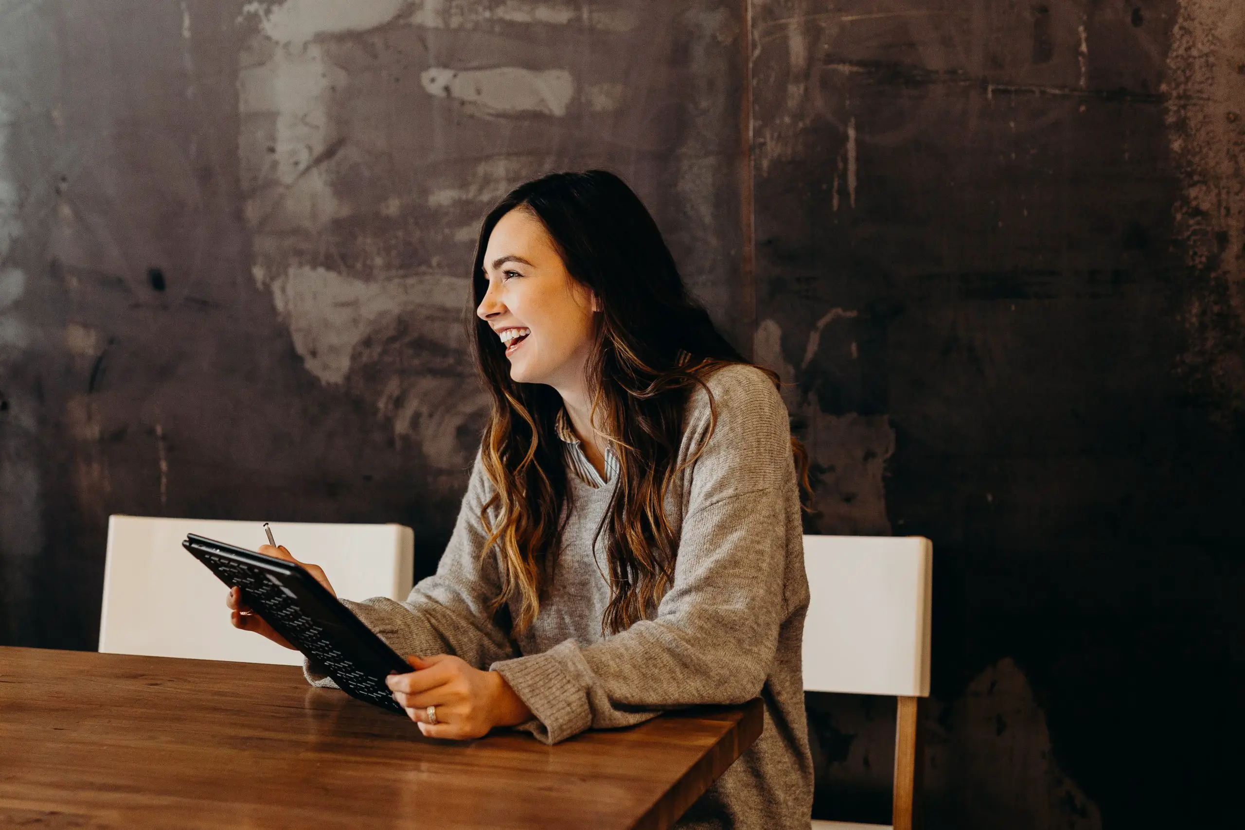 woman asking pre-screening questions to potential tenants